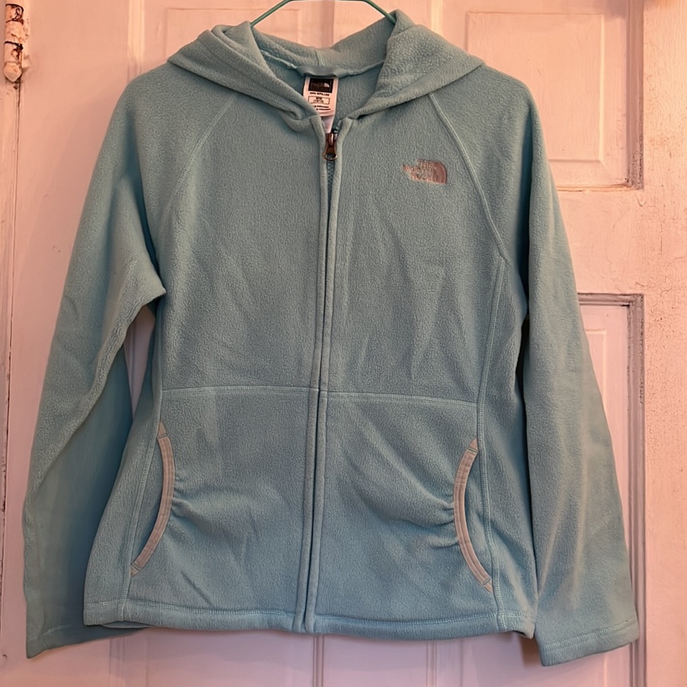 The North Face girls blue fleece hoodie in size medium/10-12